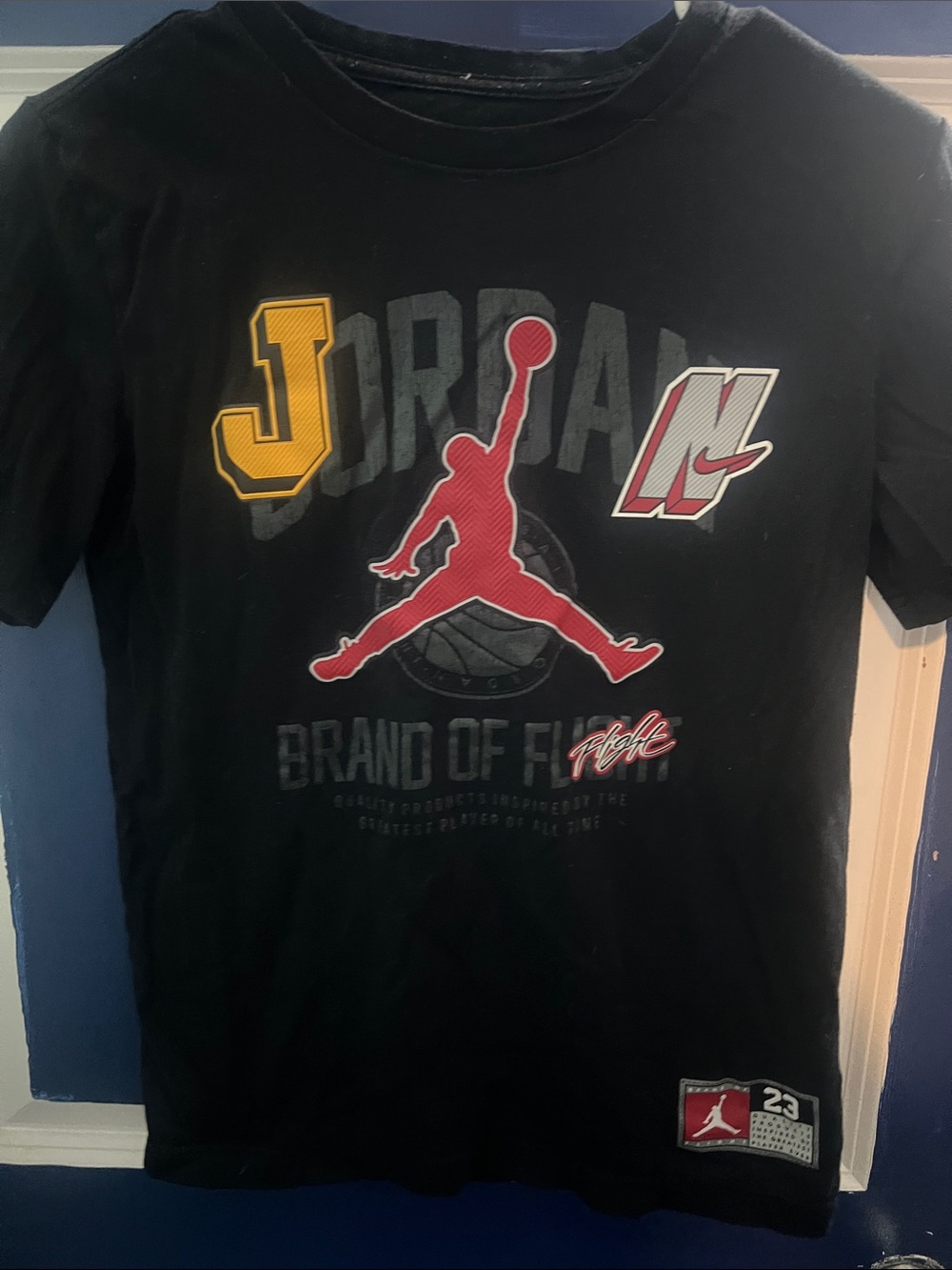 Jordan Black Tee with Red Jumpman & Yellow Accent